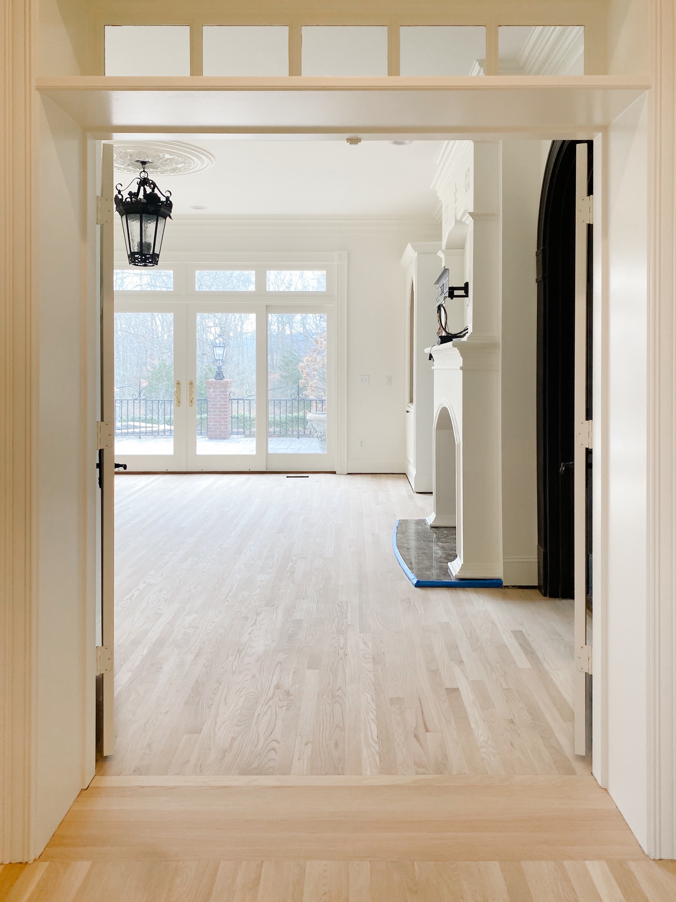 Elegant foyer with light hardwood flooring